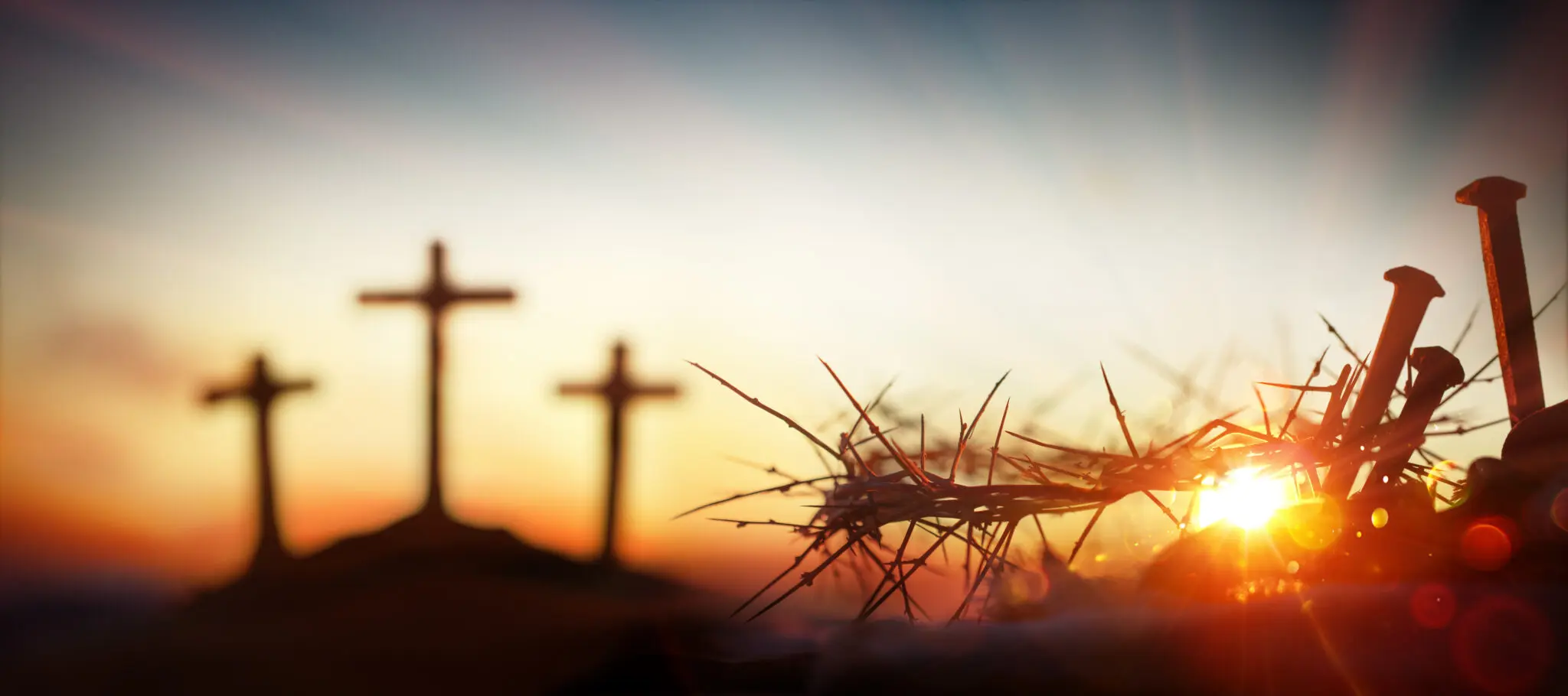 Crucifixion Calvary –  Crown Of Thorns And Bloody Spikes At Sunset