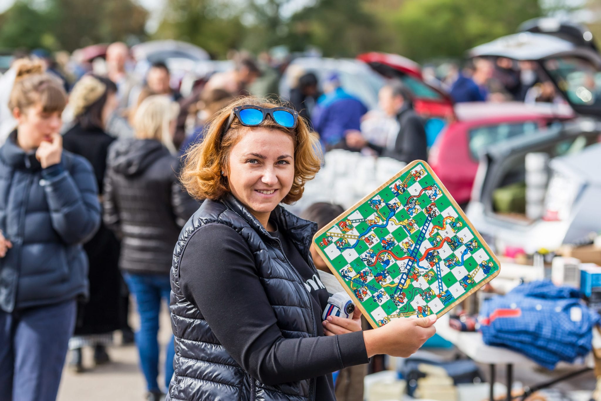 Woman Shopping at Church Yard Sale